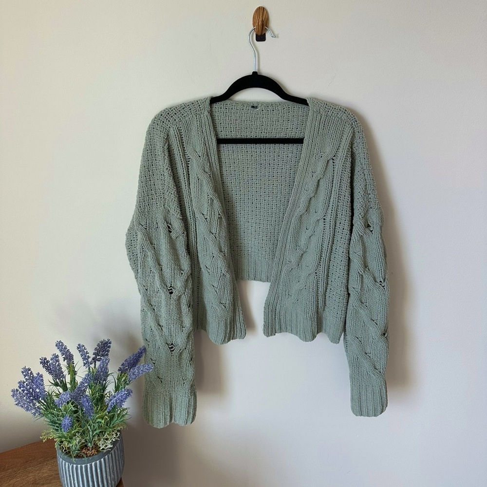 Green knitted cardigan